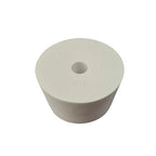White rubber bung with a central hole on a white background