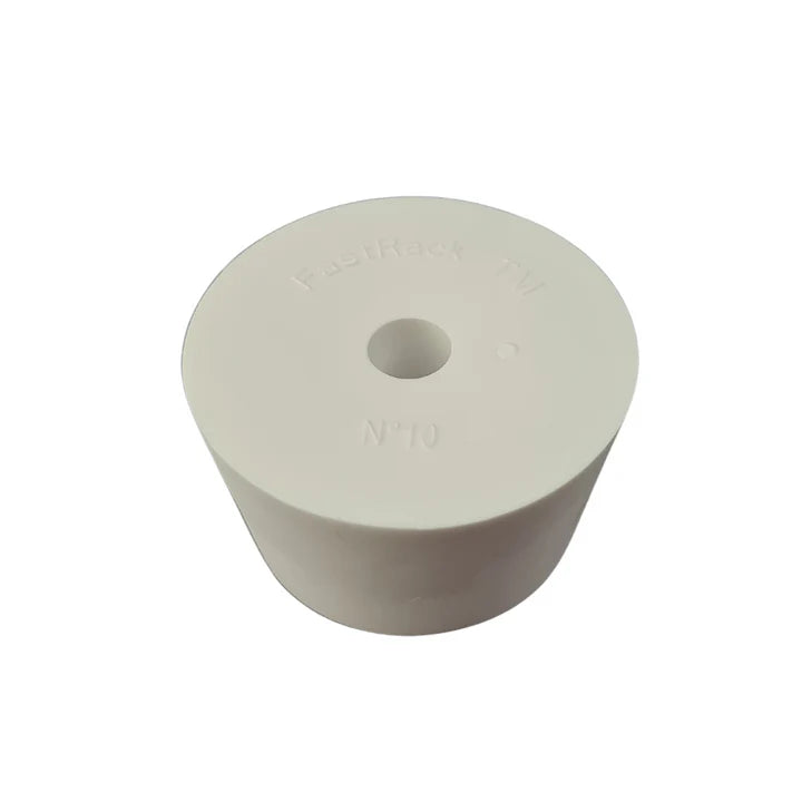 White rubber bung with a central hole on a white background