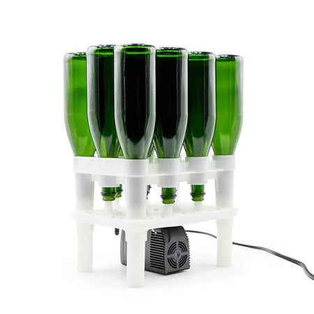 FastWasher 12 beer and wine bottle cleaner, showing the compact bottle washer with cleaning brushes and bottle holders.