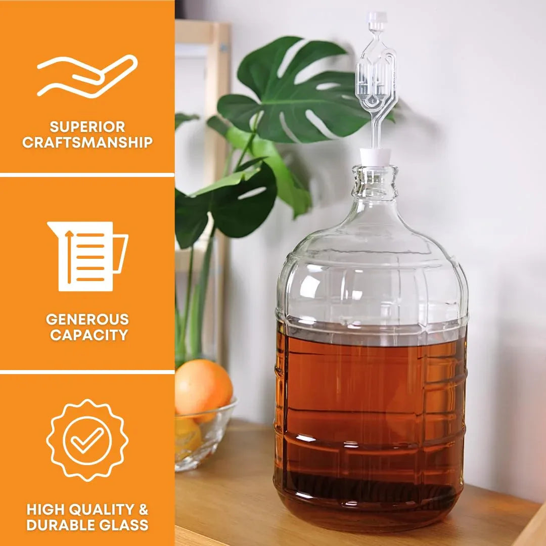 Clear 5-gallon Italian glass carboy by FastRack with a wide mouth and sturdy handle for home brewing or fermentation.