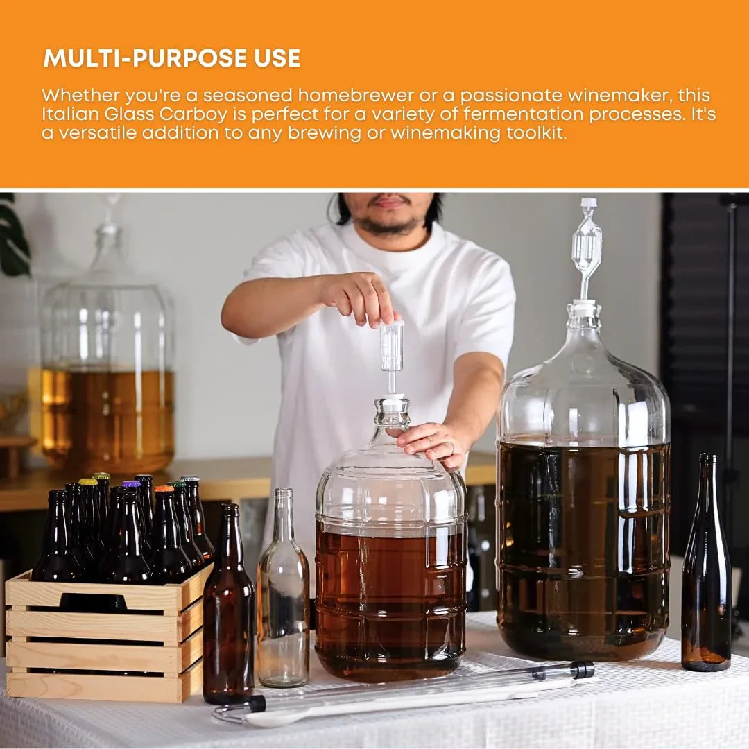 Clear 5-gallon Italian glass carboy for fermentation by FastRack, featuring a wide opening and sturdy handle for home brewing.