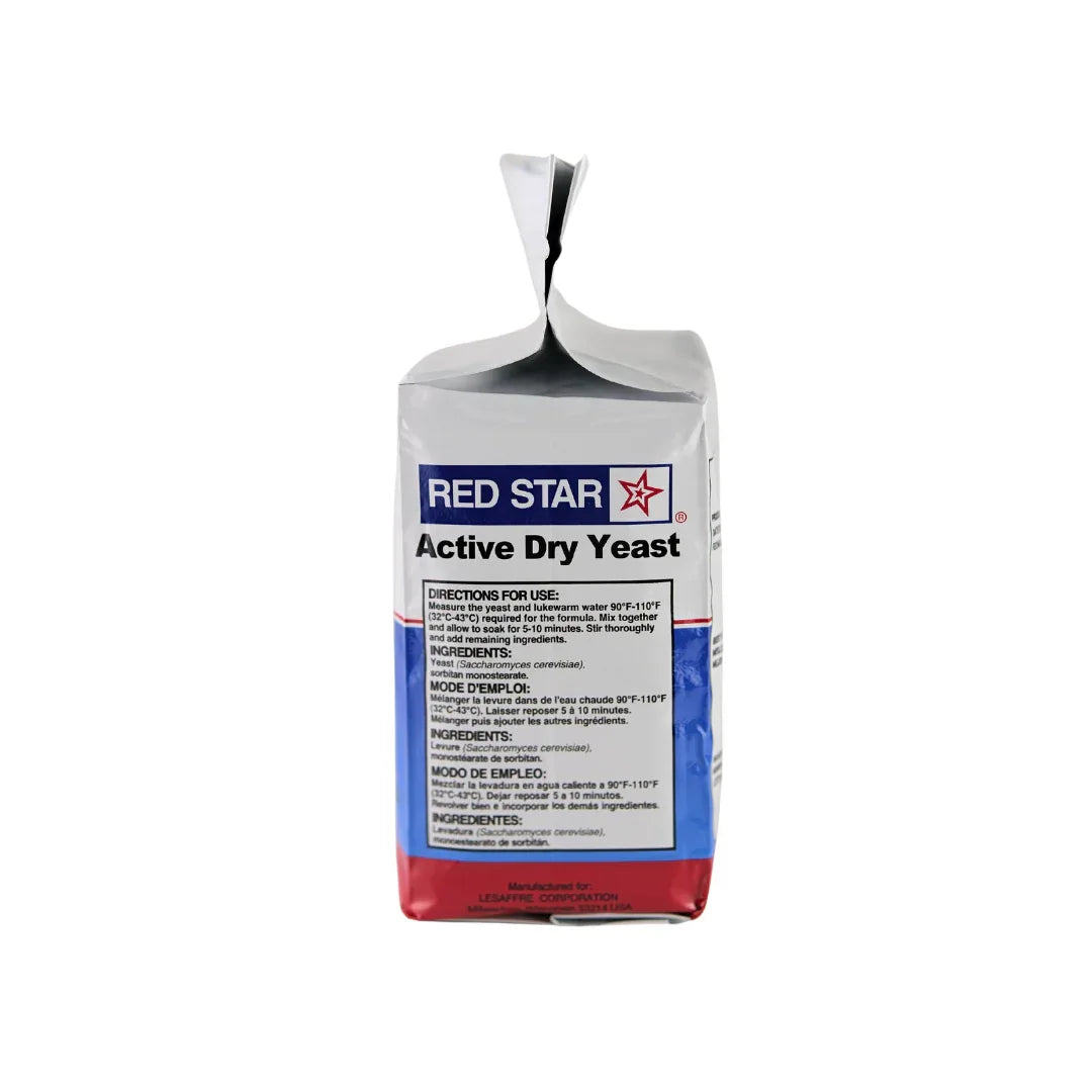 Red Star Active Dry Baking Yeast in a 2 lb package by FastRack, showing the yeast granules in a clear container.