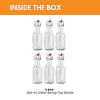Set of six 500ml clear swing top bottles by FastRack, featuring glass bottles with secure metal caps for beverages or storage.
